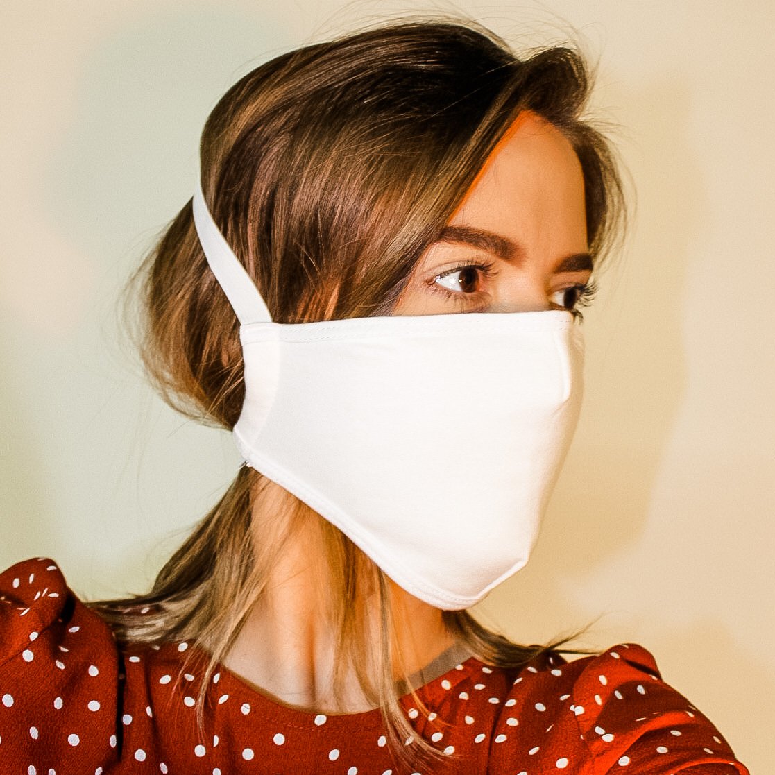 White overhead face mask with filter pocket by Maroon Niobe, made in the USA, designed for healthcare use.