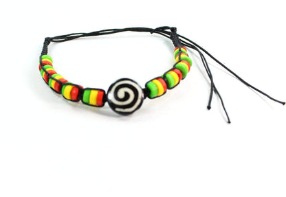 Colorful spiral and Rasta vibes friendship bracelet by Silver Hestia with vibrant bead accents and woven cord design.
