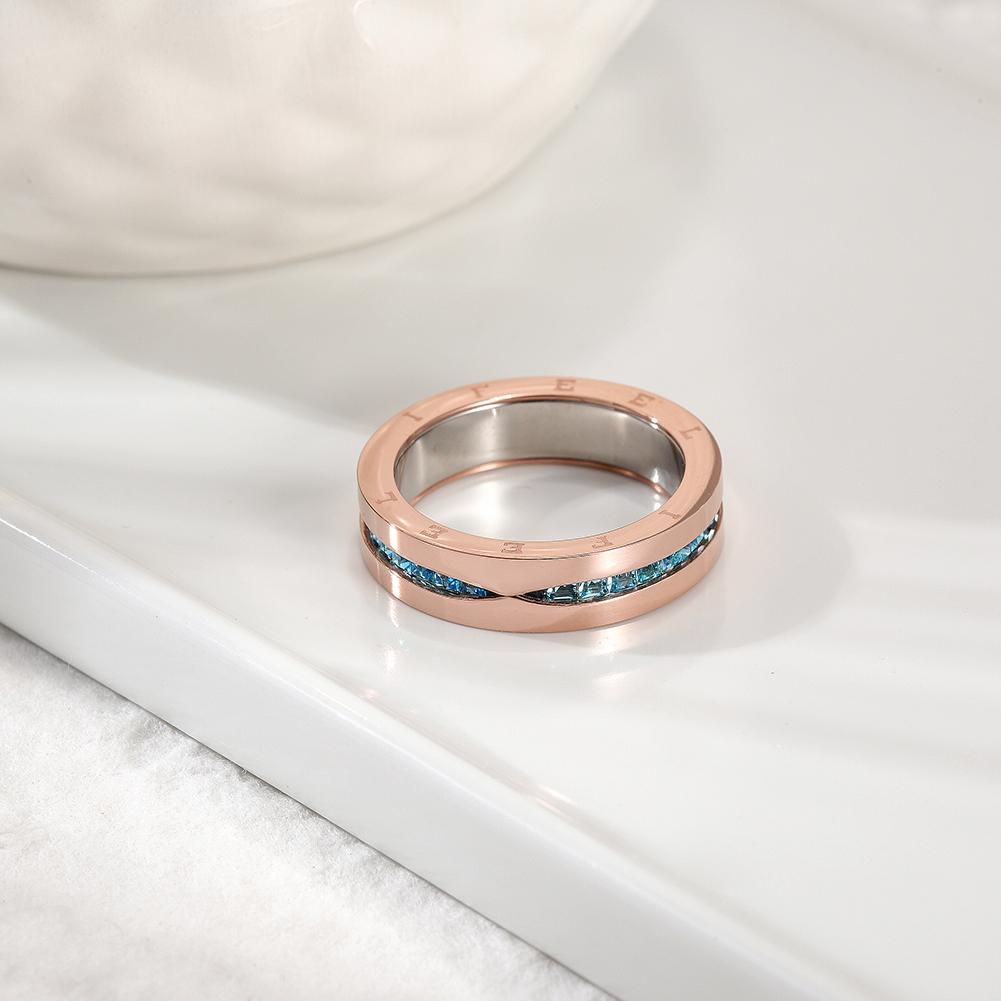 Lavender Phoebe pavé statement ring with sparkling gemstones, showcasing a bold, elegant jewelry piece on a neutral background.
