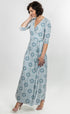 Salmon Bella Natalie dress displayed on a hanger, featuring a stylish, elegant design with flowing fabric and detailed neckline.