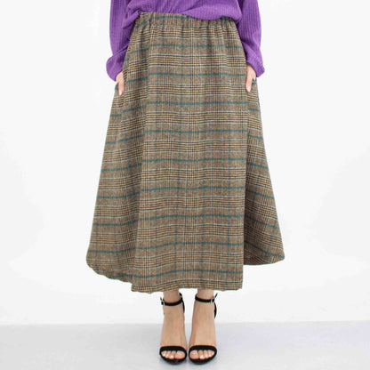 Blue plaid flare midi skirt with side pockets by Yellow Hera, featuring a stylish and comfortable design.