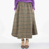Blue plaid flare midi skirt with side pockets by Yellow Hera, featuring a stylish and comfortable design.