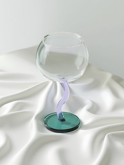 Handblown bubble wine glass with wavy stem, retro whimsical design, eclectic style for home decor by Inspecial Home.