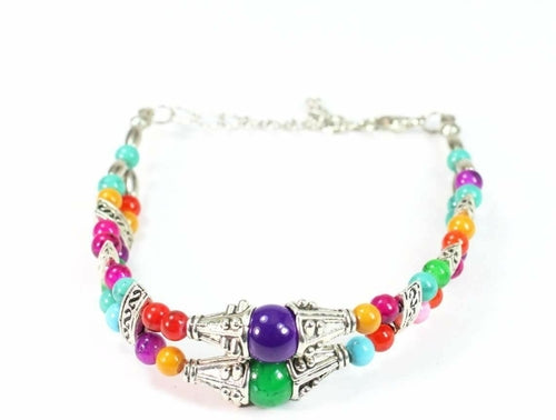 Silver Hestia double strand marbled beaded bracelet with round and oval beads on a white background.