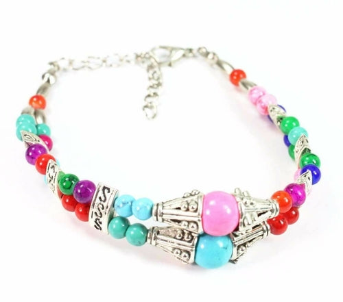 Silver Hestia double strand marbled beaded bracelet with round beads, stylish and versatile jewelry accessory.