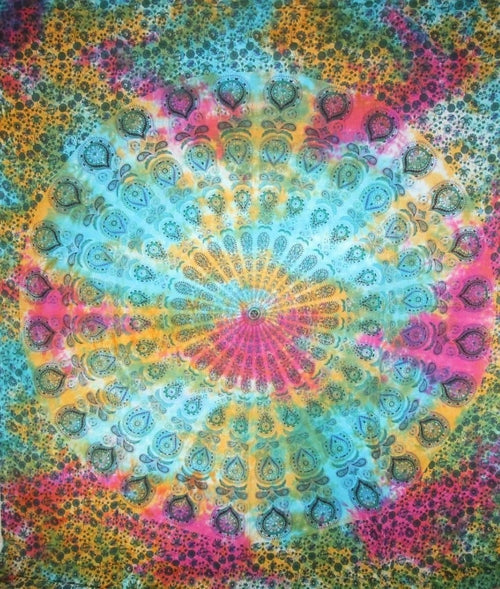 Peacock feathers mandala tapestry by Silver Hestia, vibrant home decor featuring intricate peacock feather design on fabric.