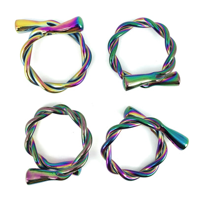 Set of 4 modern rainbow napkin rings by Gold Juniper, dishwasher safe, stylish home and garden table décor accessory.
