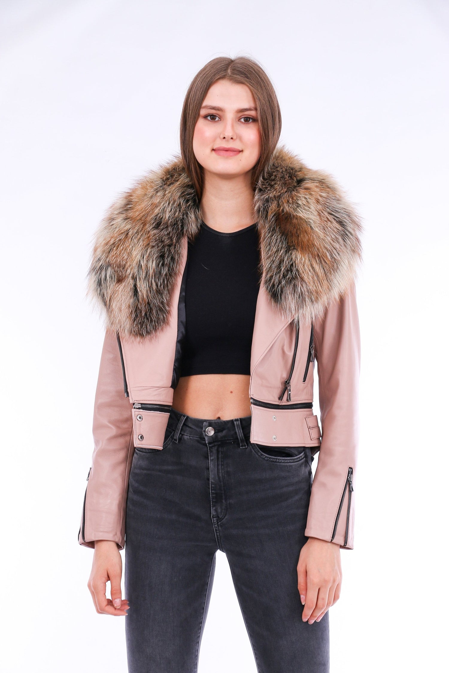 Pink leather biker jacket by Sangria Iapetus, featuring classic design and stylish details, displayed on a hanger.