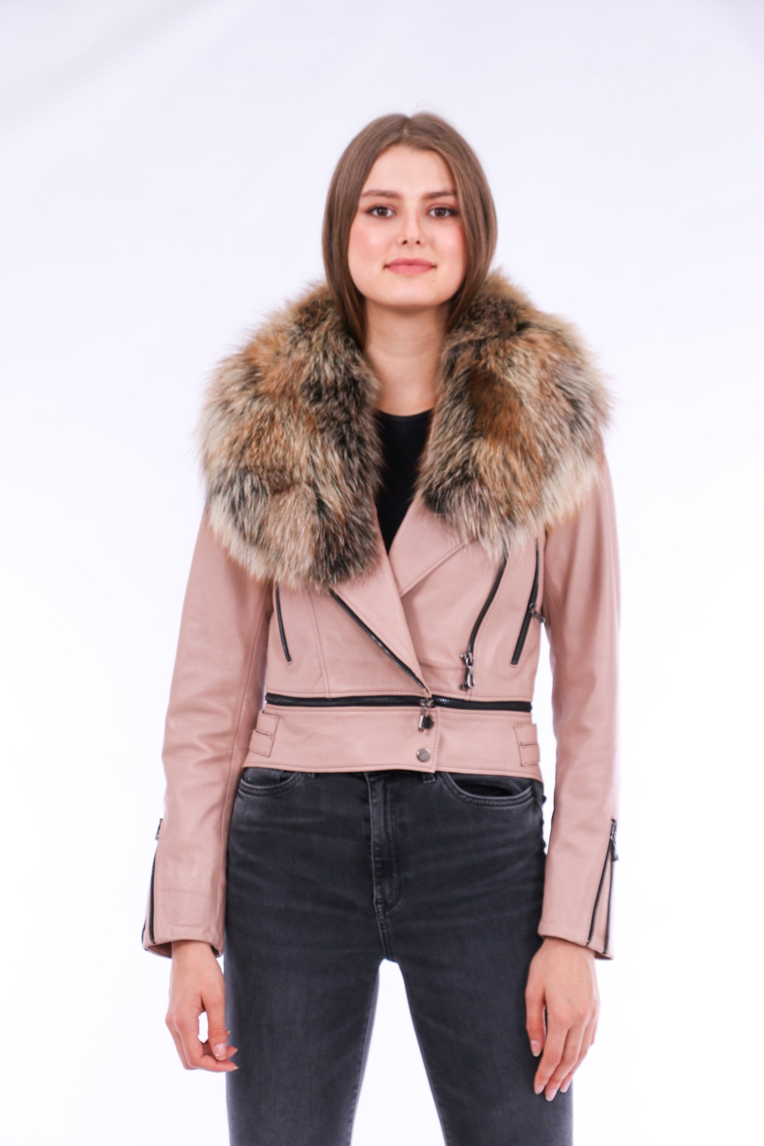Pink leather biker jacket by Sangria Iapetus, displayed on a hanger with visible lapel and silver hardware detailing.