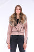 Pink leather biker jacket by Sangria Iapetus, displayed on a hanger with visible lapel and silver hardware detailing.