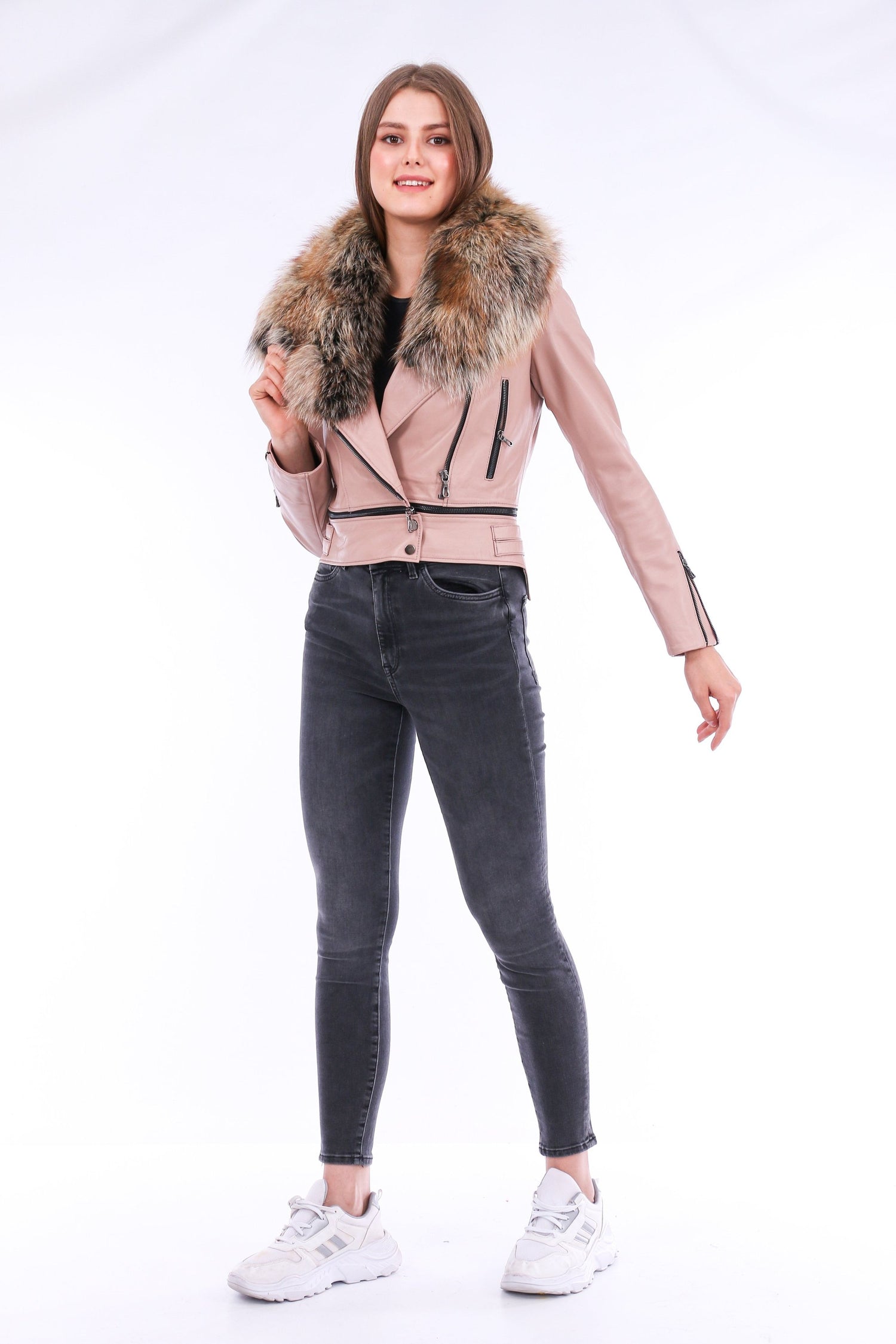Pink leather biker jacket by Sangria Iapetus with silver hardware, styled with lapel collar and zippered pockets.