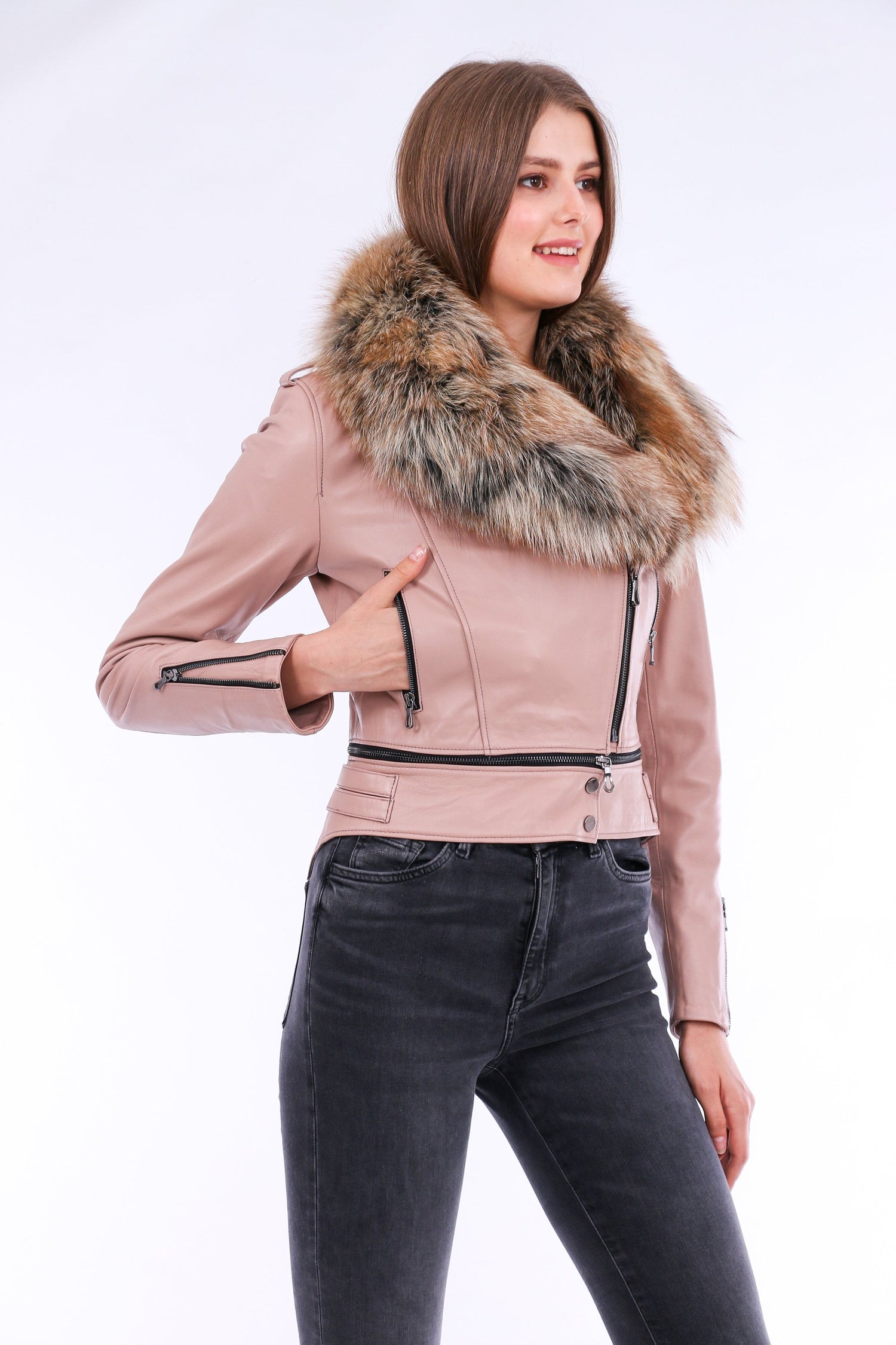 Pink leather biker jacket by Sangria Iapetus, featuring classic style and detailed stitching, shown on a hanger.