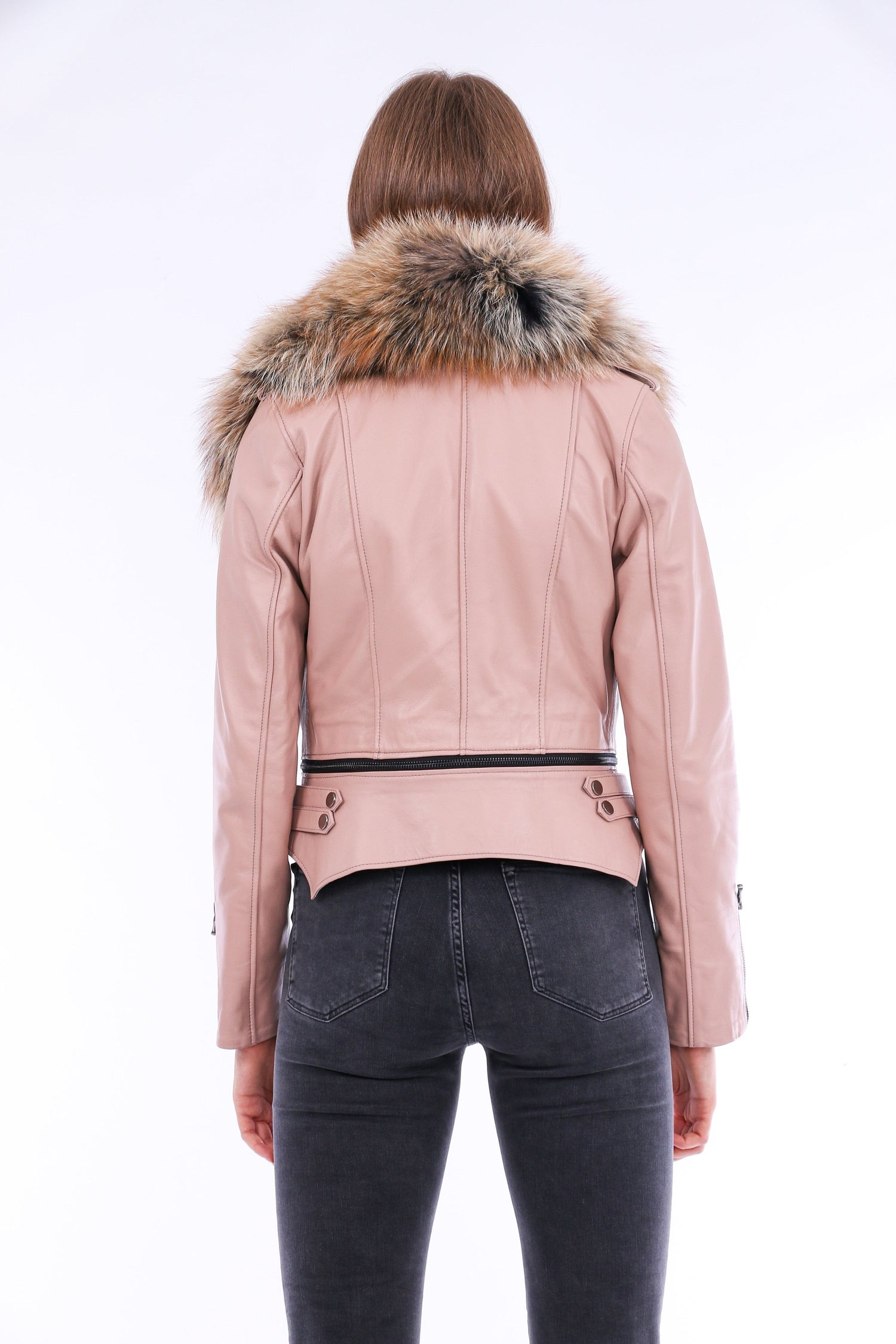 Pink leather biker jacket by Sangria Iapetus, featuring classic design and silver hardware, displayed on a hanger.