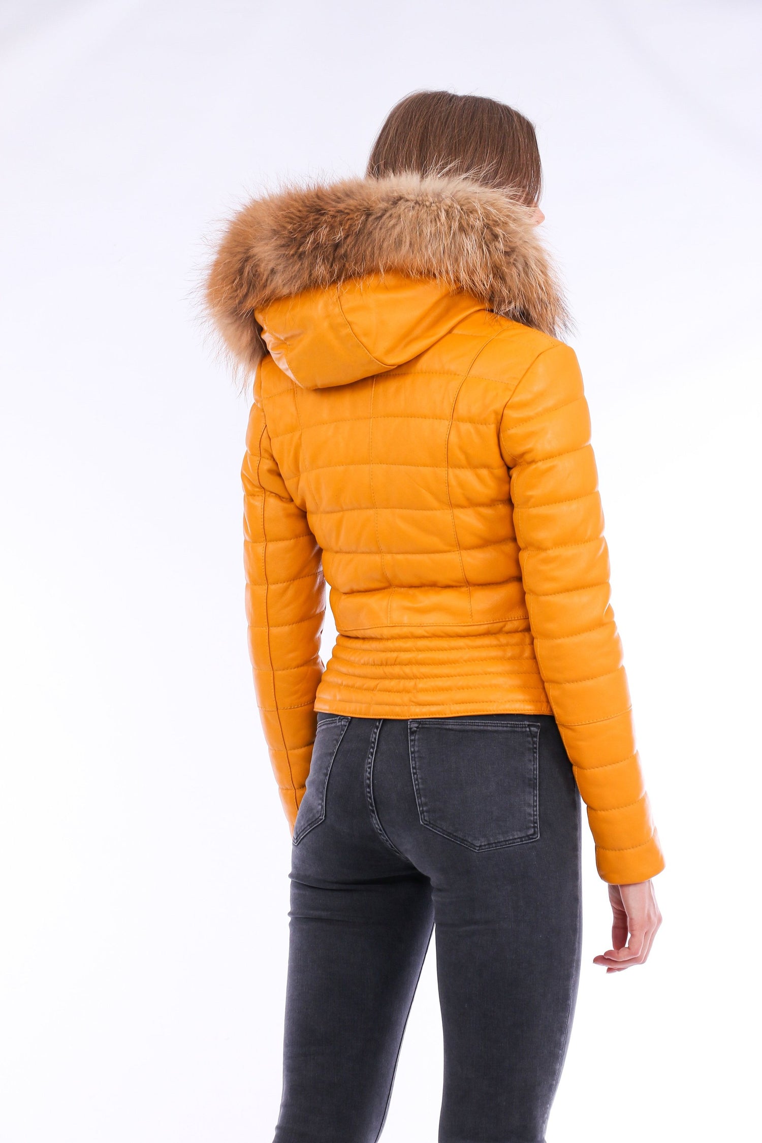 Sangria Iapetus Anoraq quilted leather jacket with a fitted design and quilted pattern, displayed on a hanger.