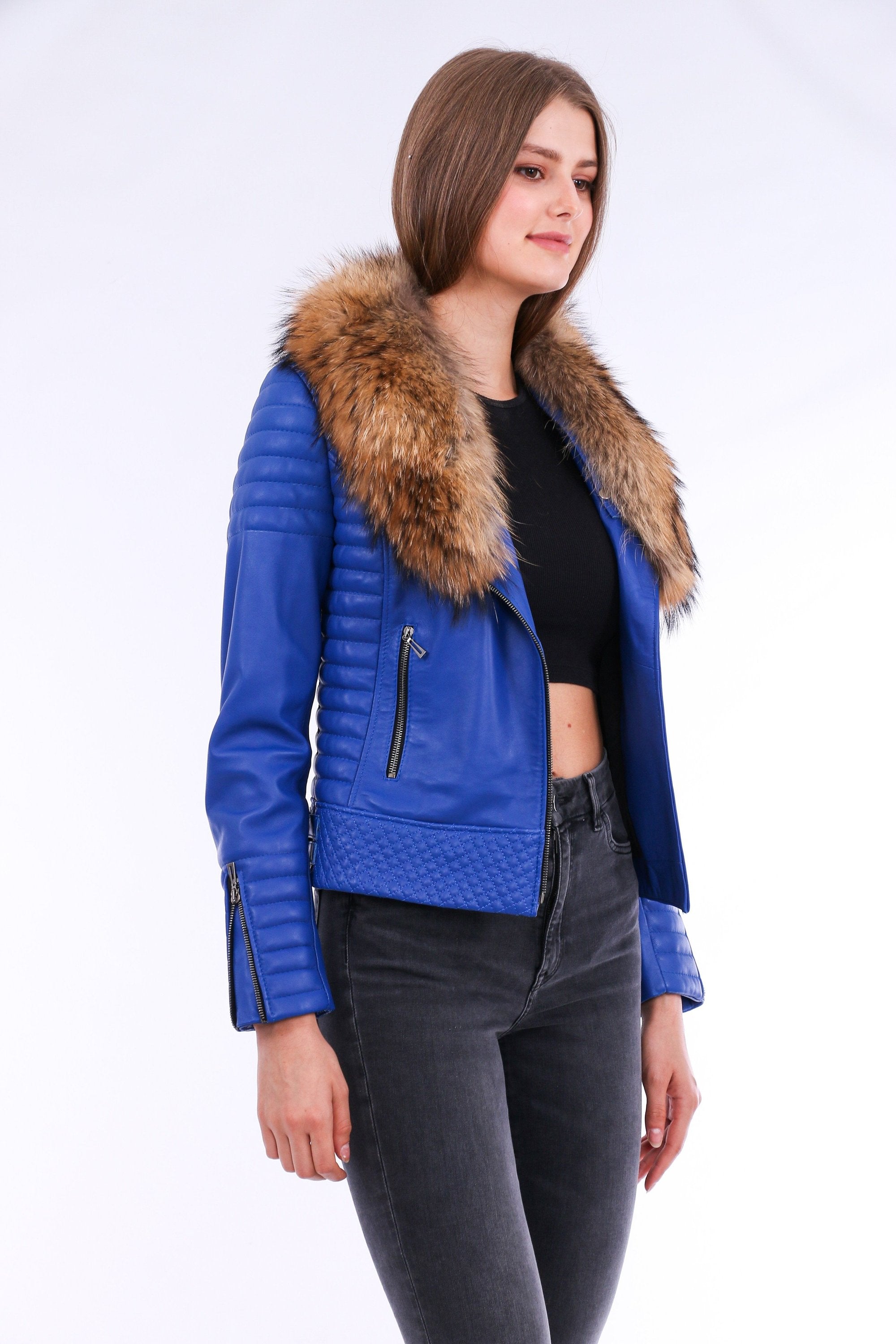 Blue Milani Quilted Leather Biker Jacket by Sangria Iapetus, featuring quilted details and classic biker style, shown on a hanger.
