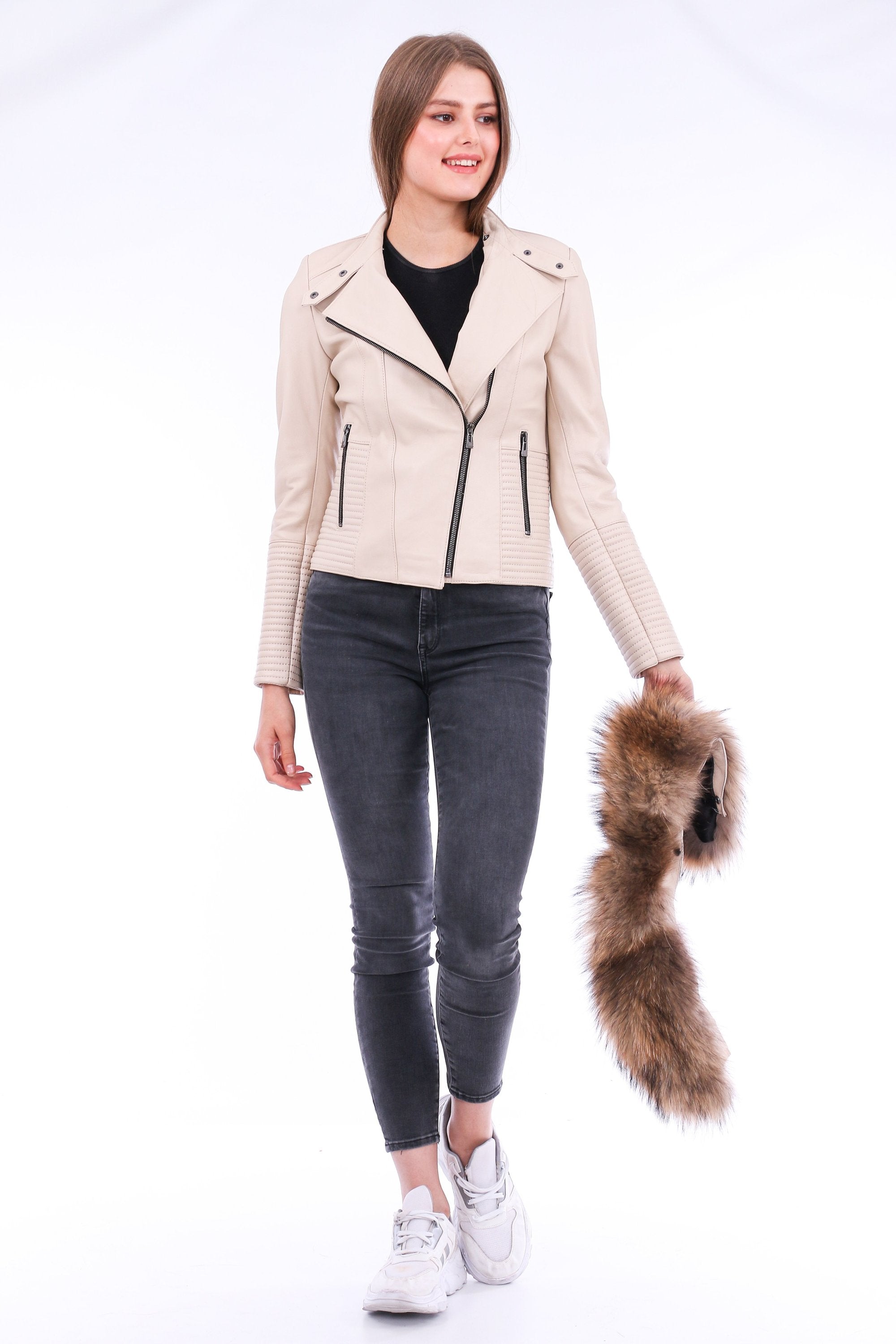 White Ravenna leather biker jacket by Sangria Iapetus with silver zippers and structured collar, displayed on a hanger.