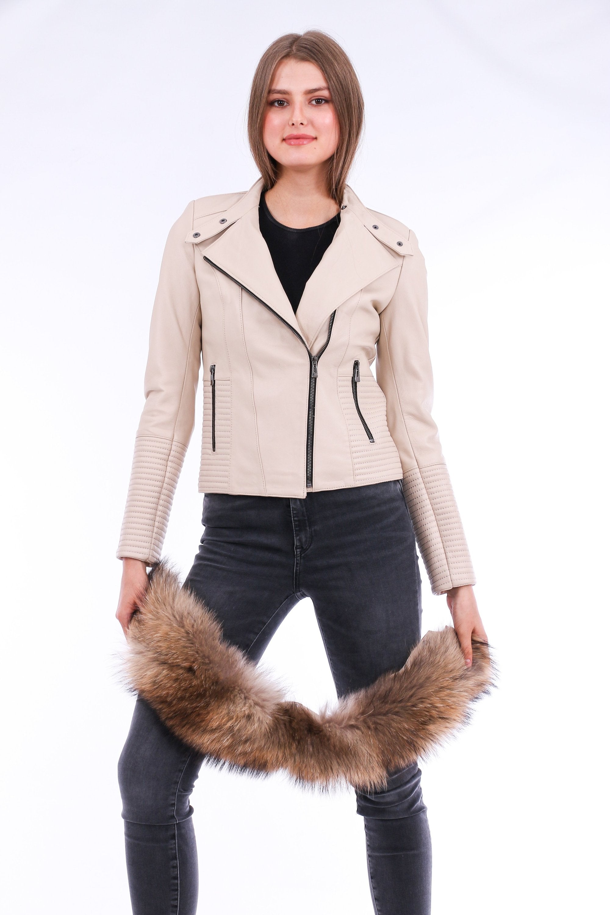 White Ravenna Leather Biker Jacket by Sangria Iapetus with silver hardware, shown on a hanger.