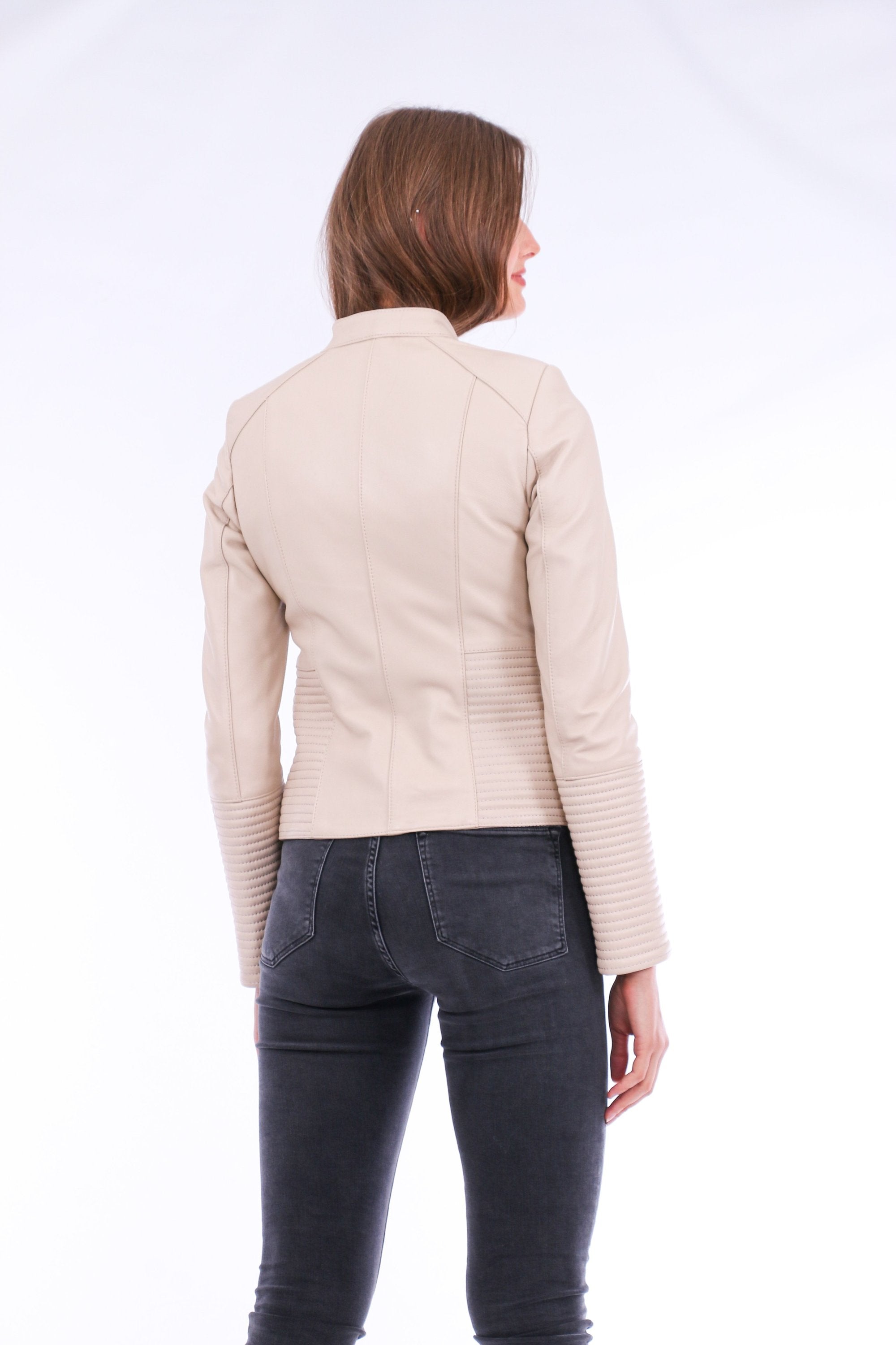 White Ravenna leather biker jacket by Sangria Iapetus, featuring classic design and detailed stitching, displayed on a hanger.