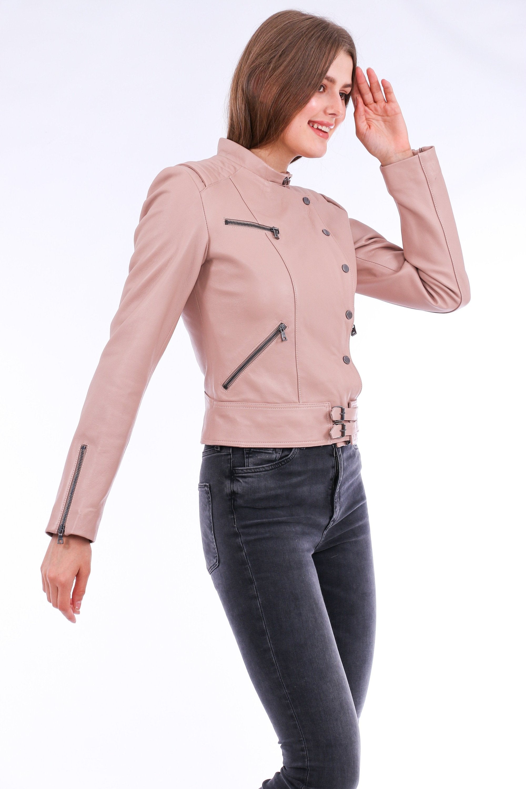 Pink Rovigo leather biker jacket by Sangria Iapetus, featuring classic design and detailed stitching, displayed on a hanger.