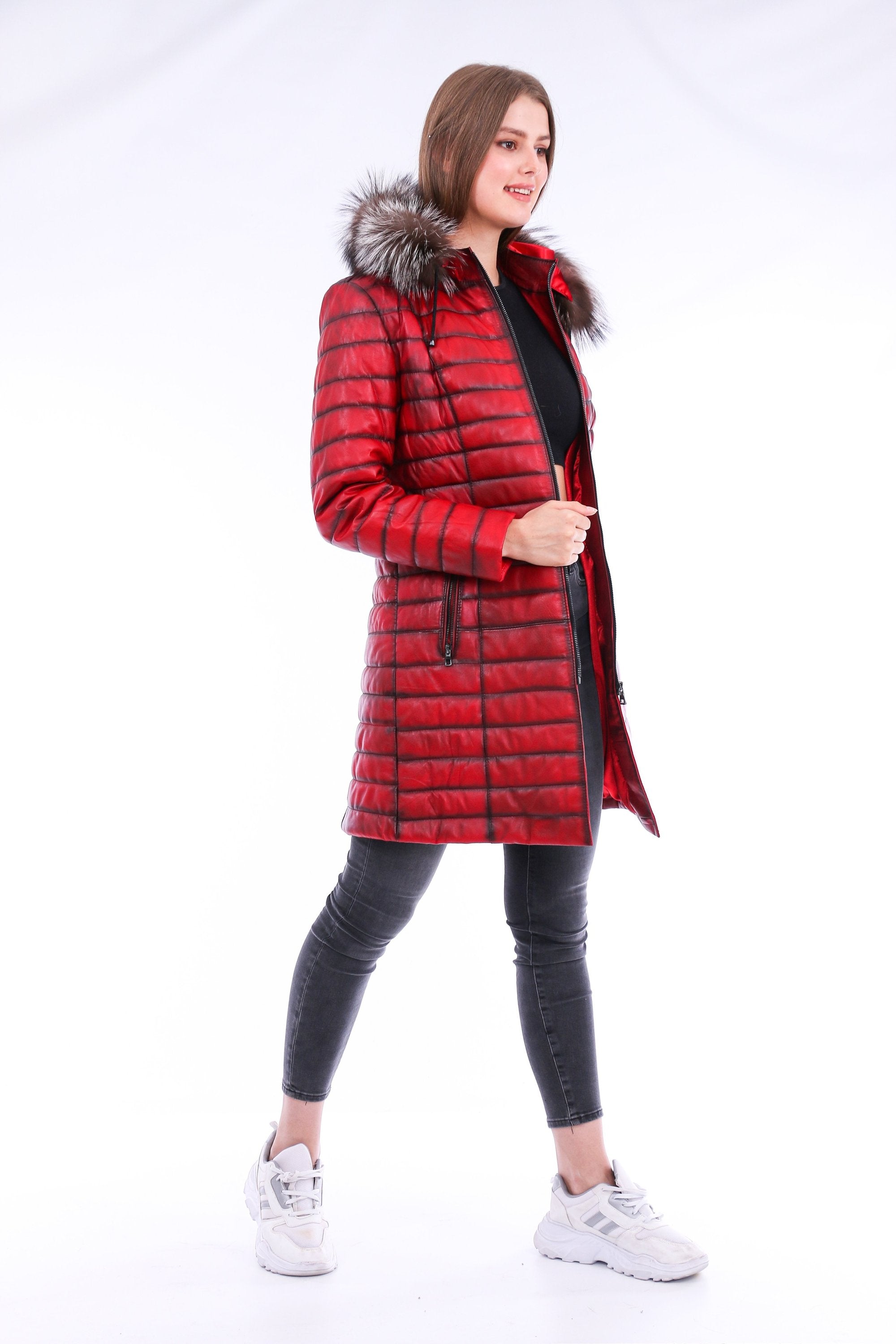 Sangria Iapetus Inverno leather trench coat in brown, stylish jacket with classic lapels and belt, on a hanger.