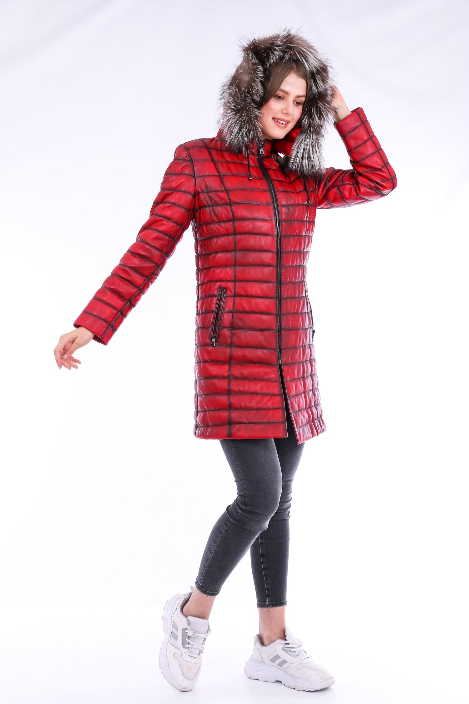 Sangria Iapetus Inverno leather trench coat shown on a hanger, featuring classic design with a belted waist and smooth leather finish.