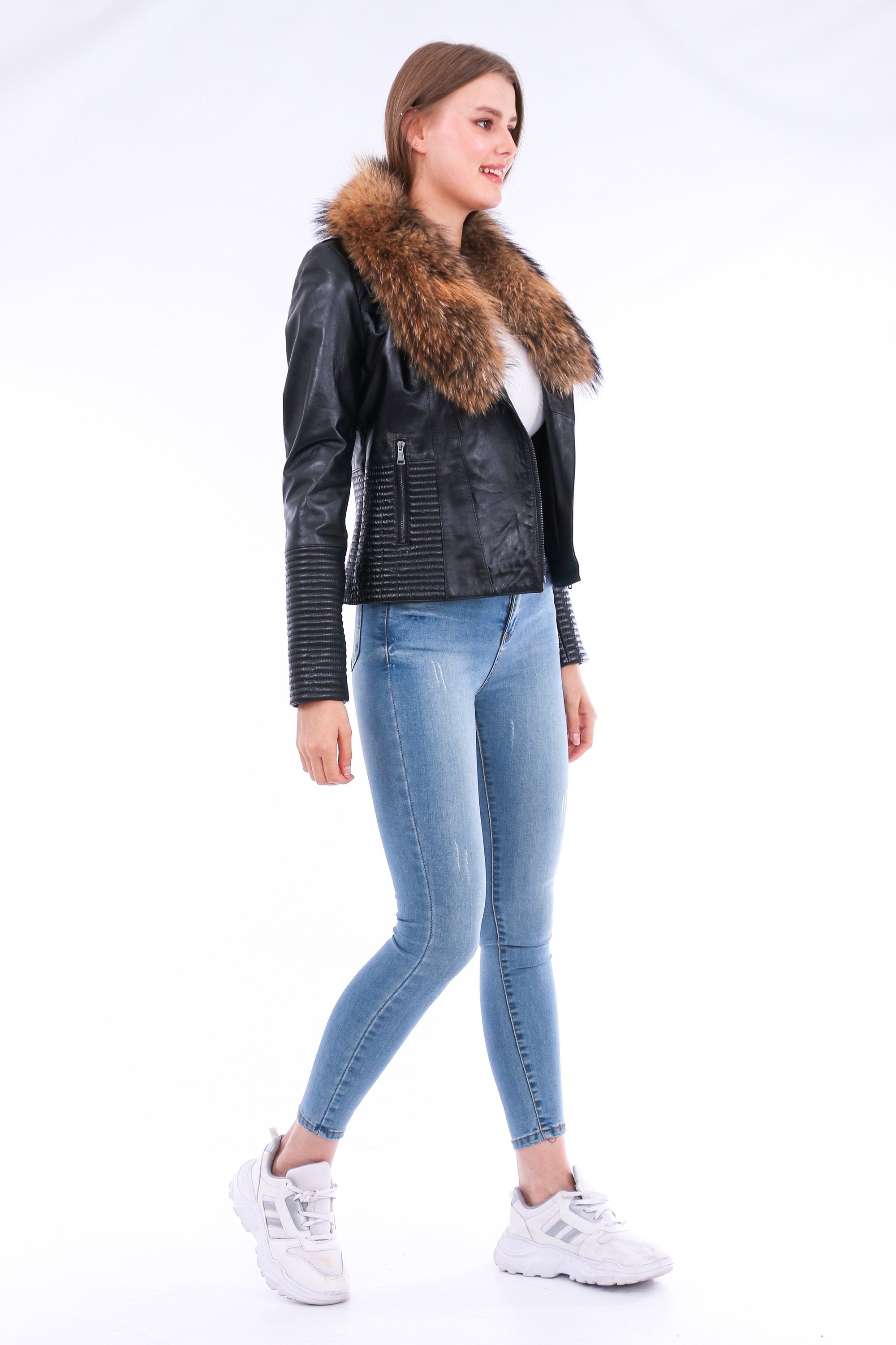 Black Ravenna leather biker jacket by Sangria Iapetus, featuring classic style and detailed stitching on a mannequin.
