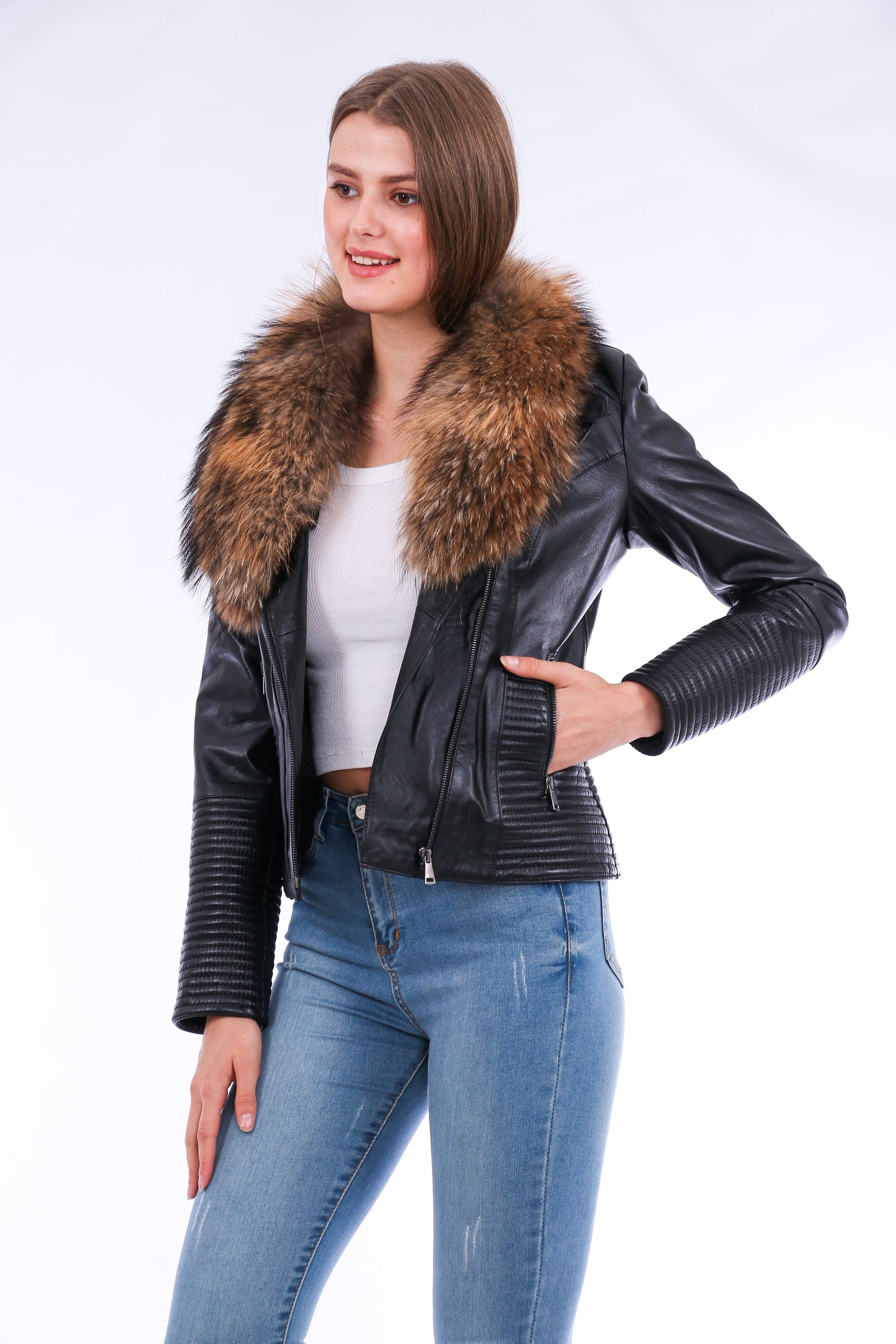 Black Ravenna leather biker jacket by Sangria Iapetus, featuring classic lapel collar and zippered front, displayed on a hanger.
