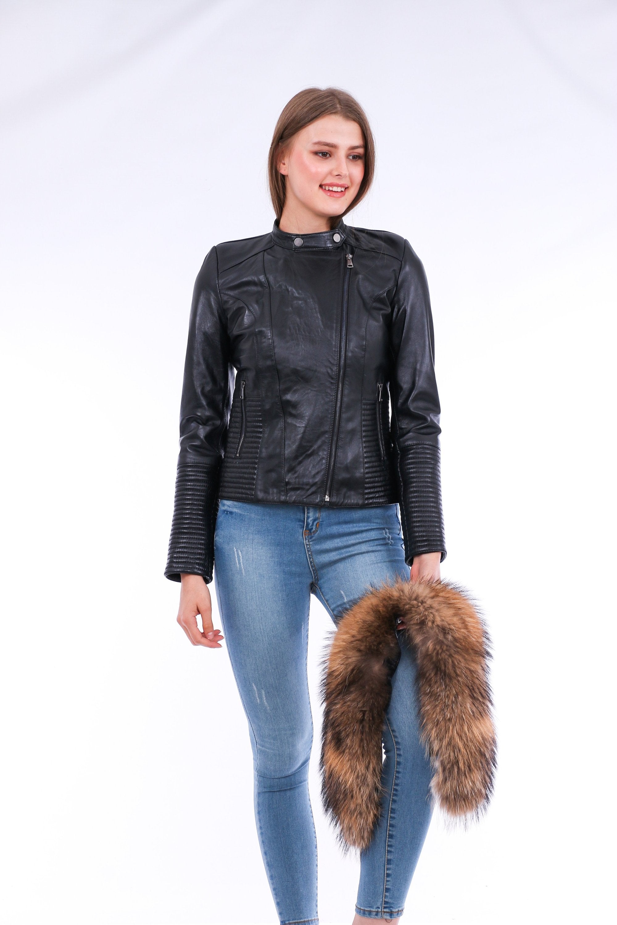 Black Ravenna Leather Biker Jacket by Sangria Iapetus with silver hardware, shown on a hanger against a neutral background.