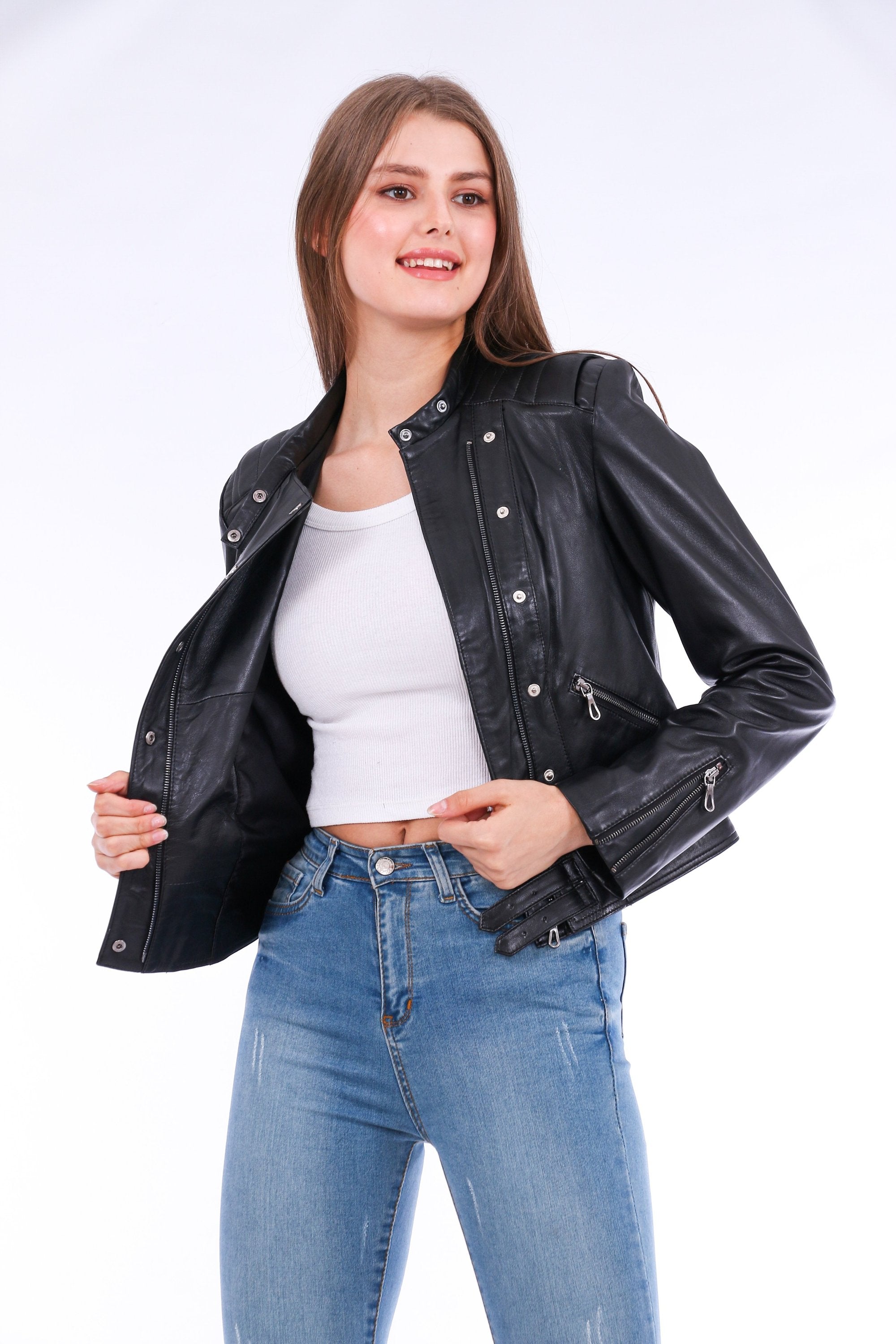 Black Rovigo leather biker jacket by Sangria Iapetus, featuring classic design and silver hardware, displayed on a hanger.