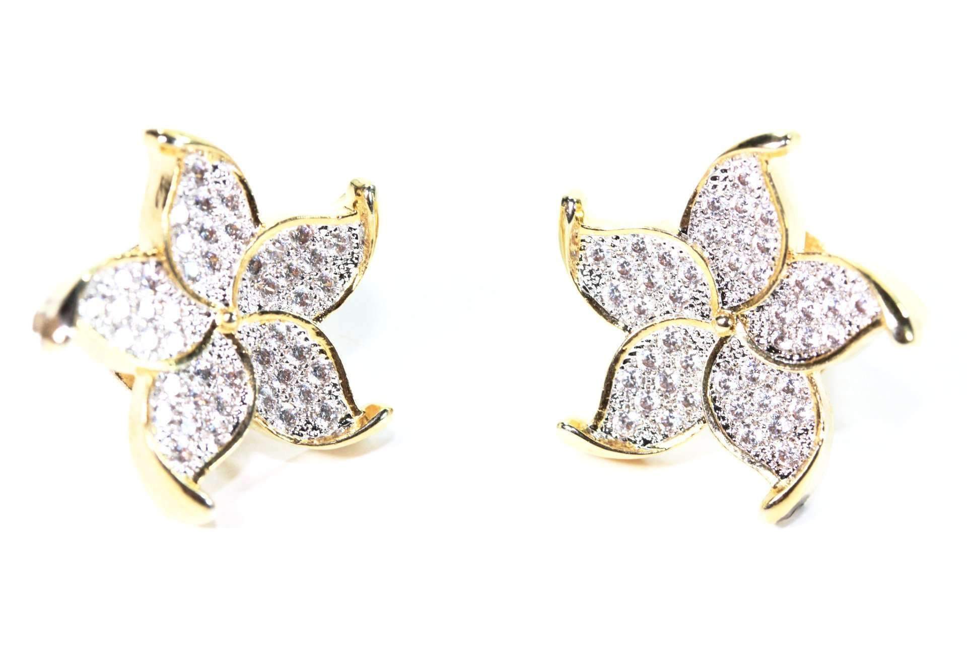 Silver Hestia five petal flower stud earrings with delicate floral design on sterling silver posts.