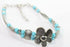 Silver Hestia petal-shaped bracelet with delicate silver flowers, perfect for elegant petal-inspired jewelry designs.