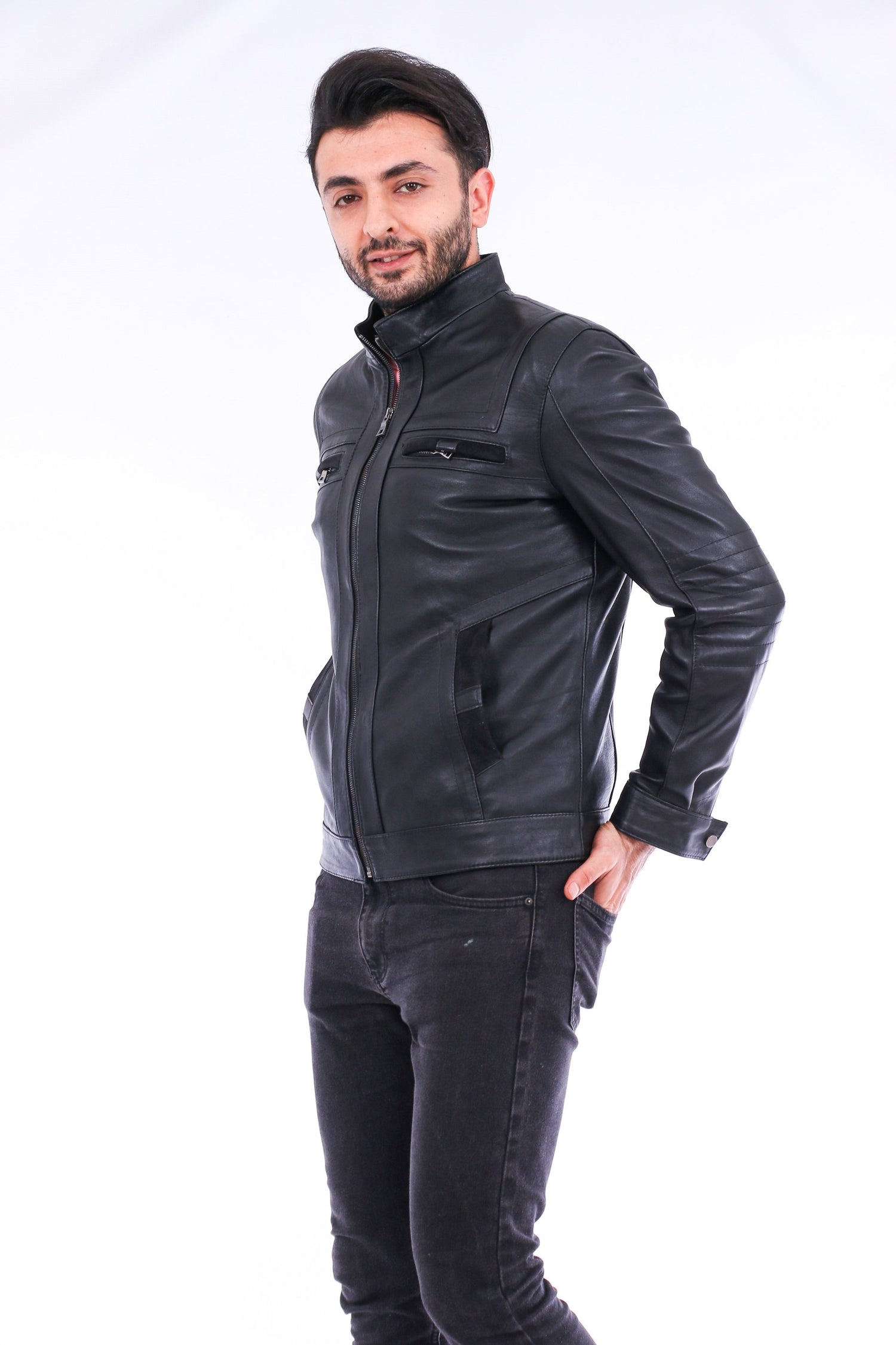 Sangria Iapetus Bosco leather jacket hanging on a wooden hanger, featuring classic design and smooth black leather material.