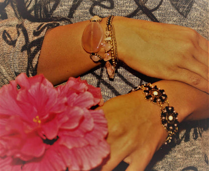 Rose quartz and crystal bracelet by Silver Hestia featuring a delicate design with pink gemstones and sparkling accents.