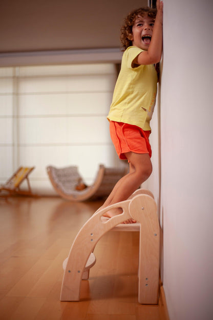 Red Oceanus foldable Montessori kitchen step stool with a wooden finish, designed for easy height access and safety.