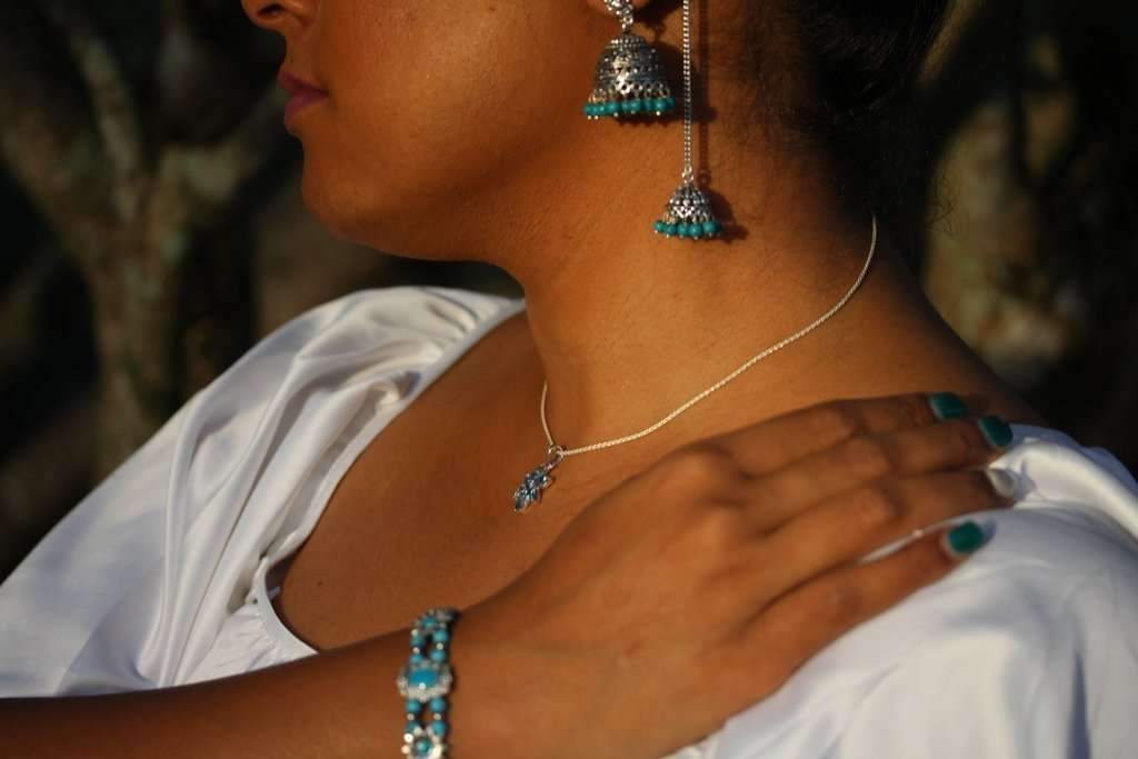 Silver Hestia Sweet Sunflower Boho bracelet featuring sunflower charms and beaded accents on a delicate chain.