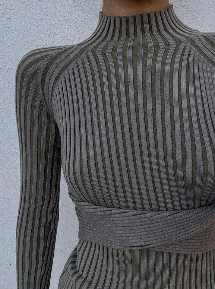 Azure Thanatos Malika Knit Dress shown on a model, featuring a fitted silhouette, long sleeves, and a textured knit fabric.