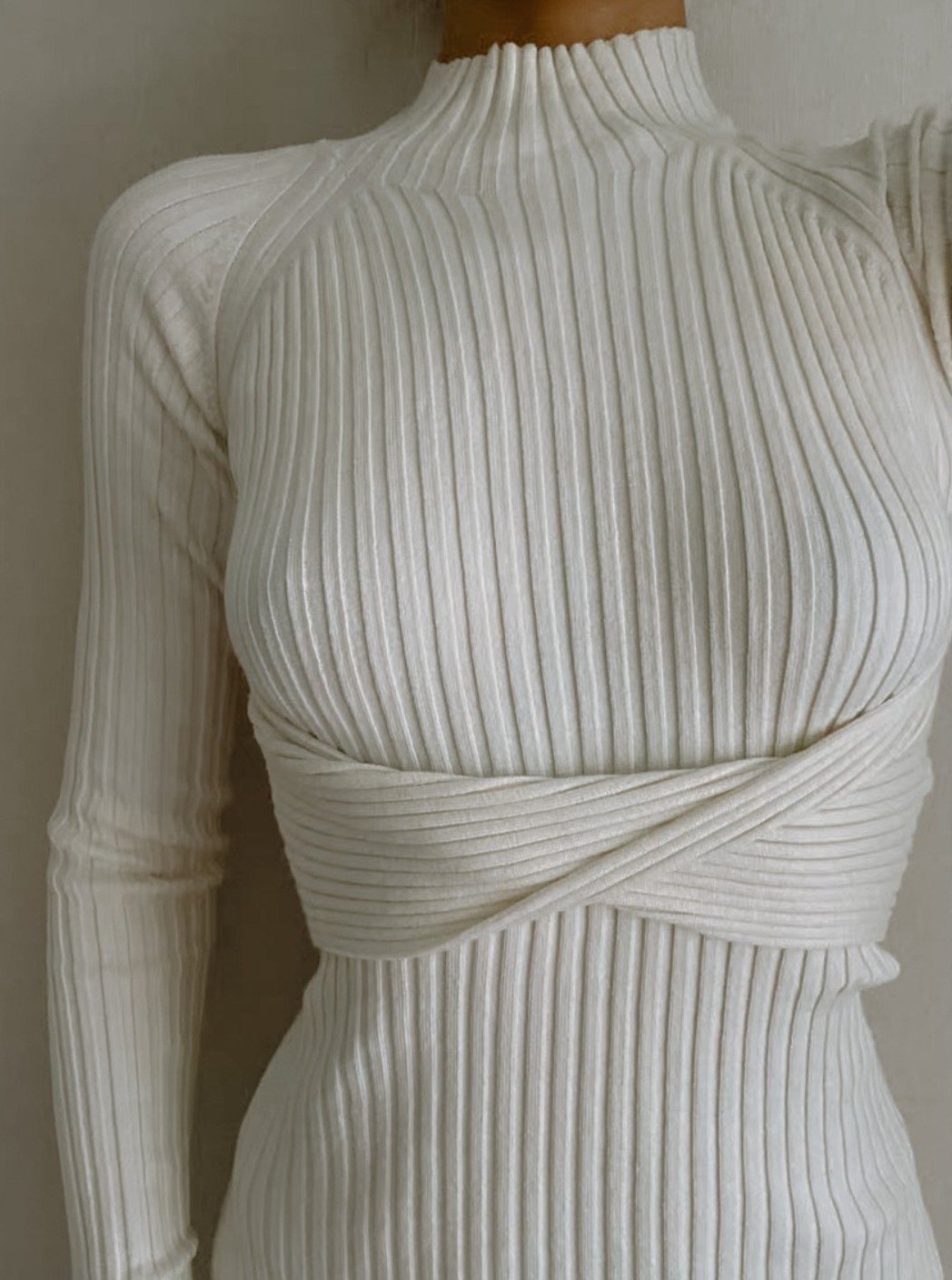 Azure Thanatos Malika Knit Dress draped on a mannequin, featuring a cozy knit fabric and stylish design for casual or semi-formal wear.