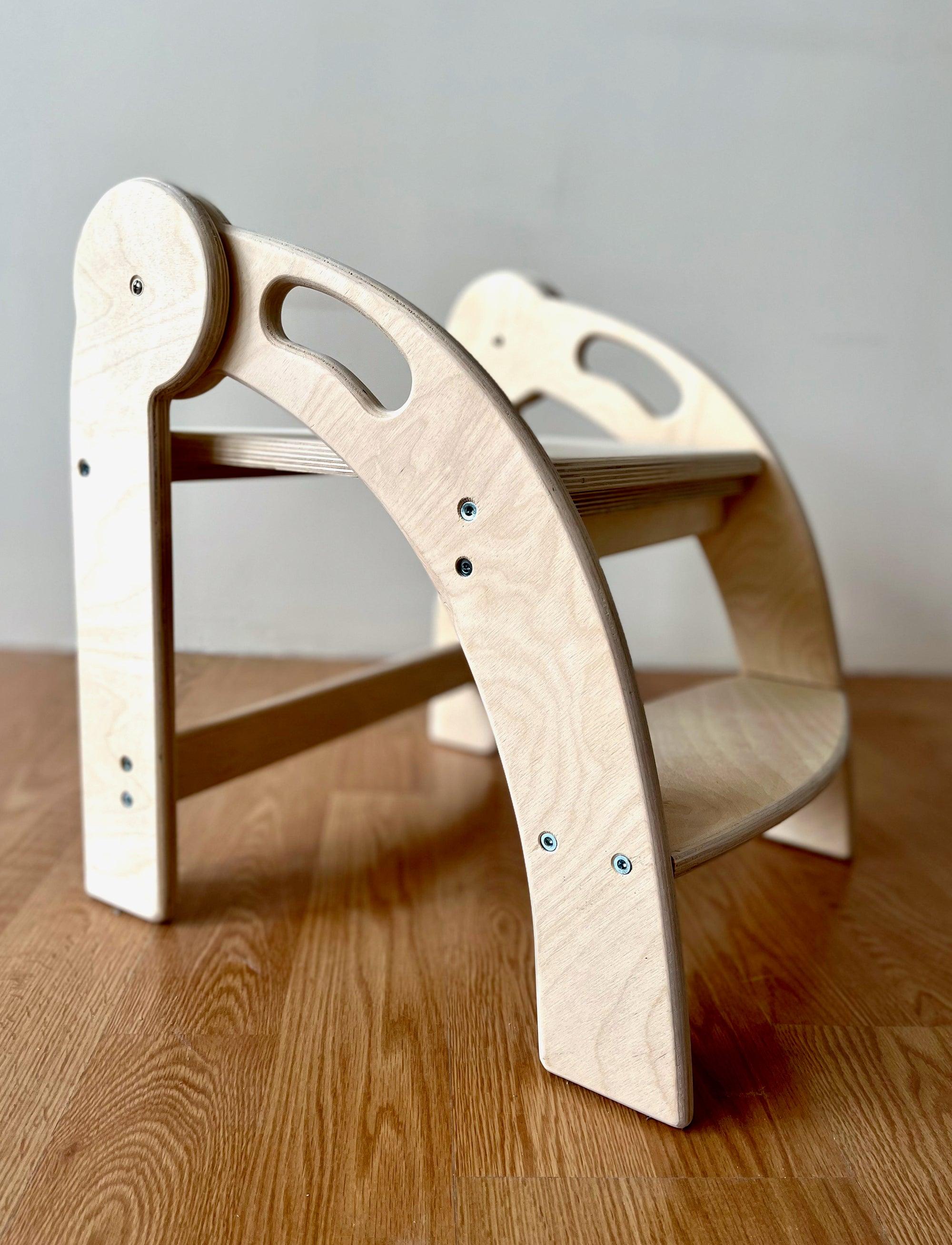 Red Oceanus foldable Montessori kitchen step stool with sturdy wooden construction and non-slip steps for safe elevation.