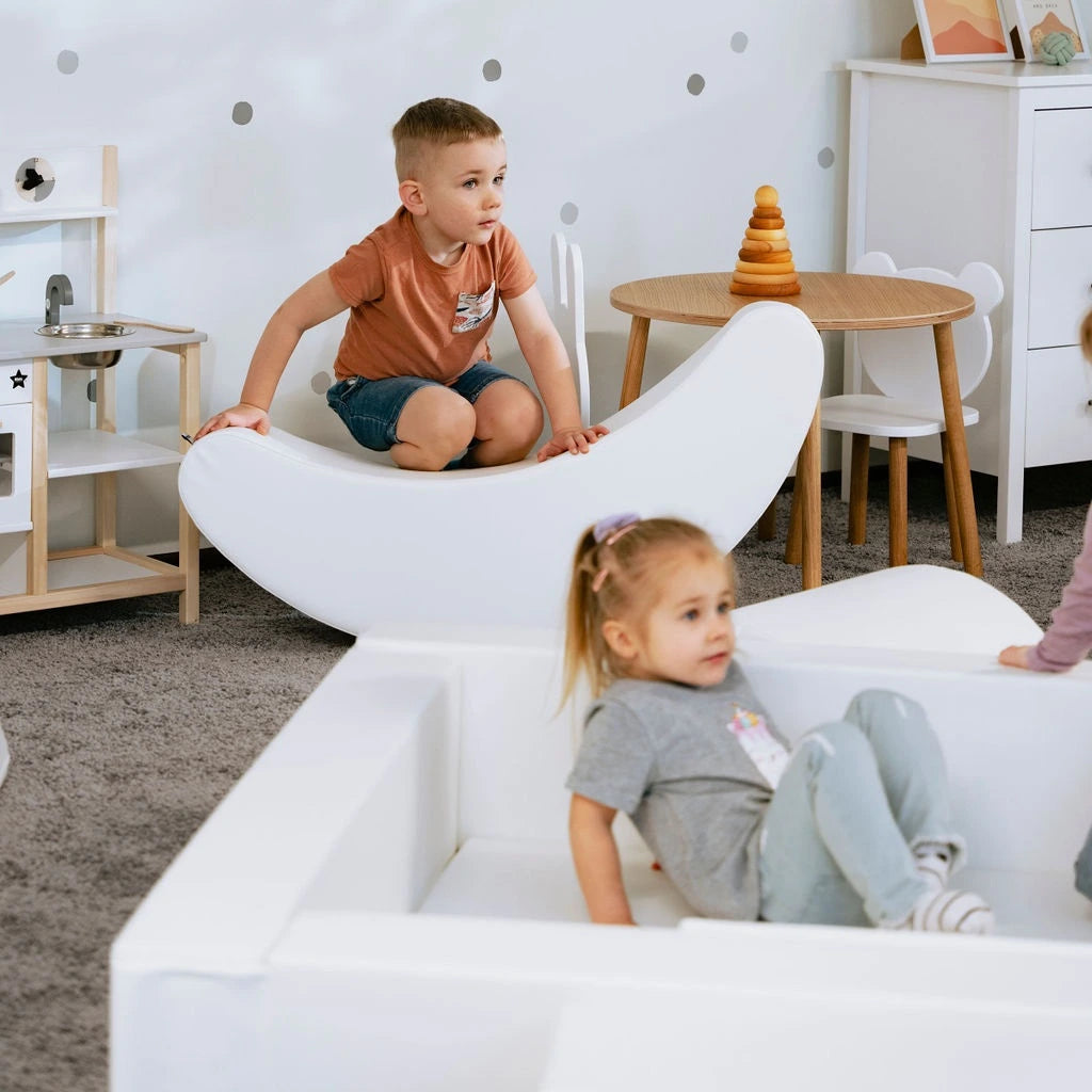 Blush Apricot Iglu furniture piece in sand-colored finish, showcasing modern design and smooth surfaces.