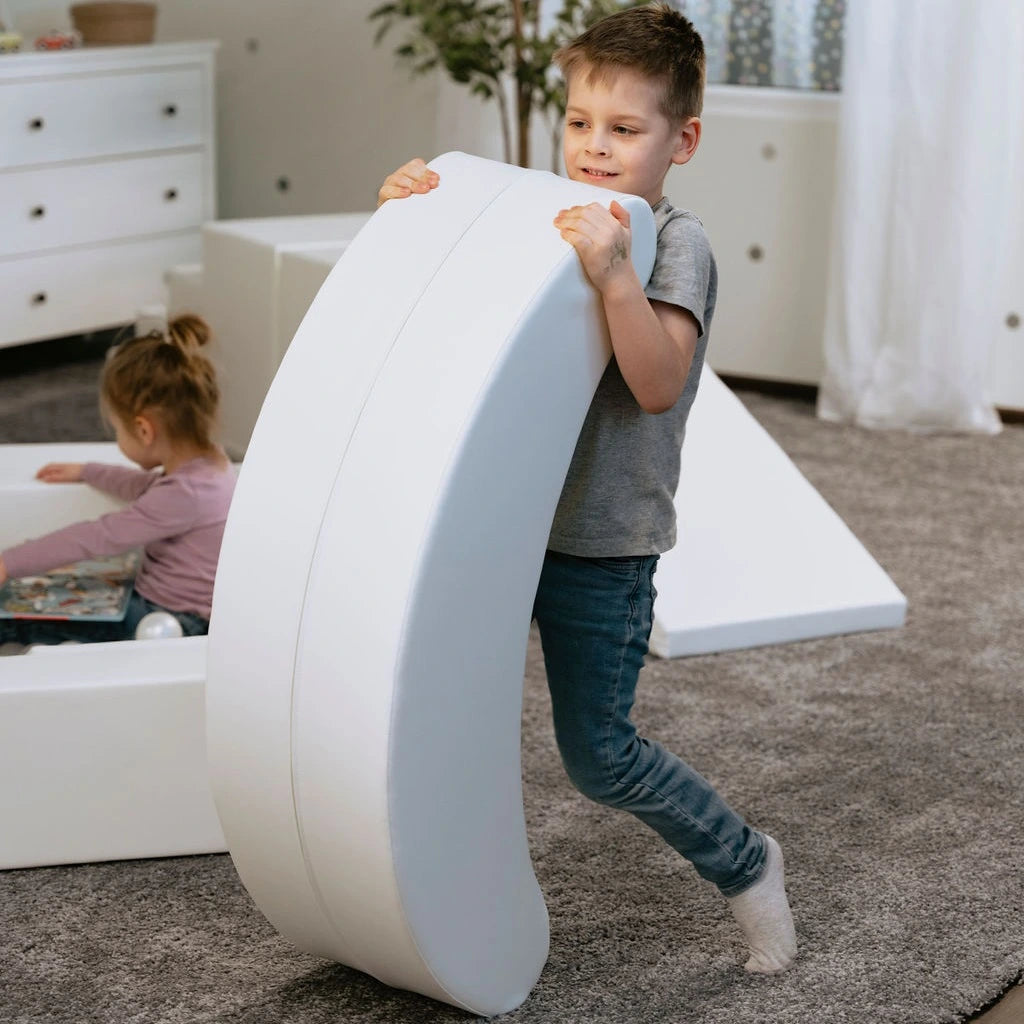 Blush Apricot Iglu furniture piece in sand-colored finish, showcasing its sleek, modern design and smooth surface.