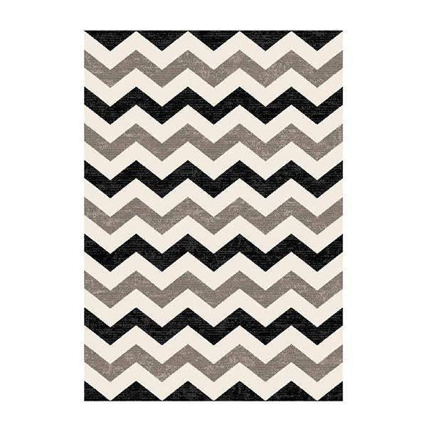 Black infinity chevron rug by Amethyst Hera with bold geometric pattern, ideal for modern home and garden decor.