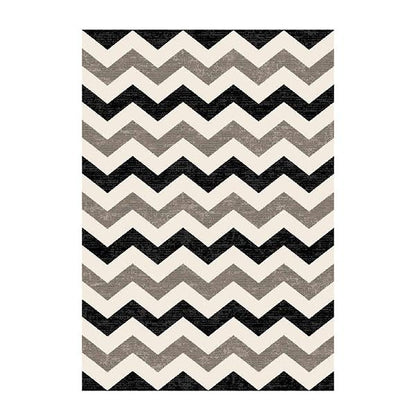 Black infinity chevron rug by Amethyst Hera with bold geometric pattern, ideal for modern home and garden decor.