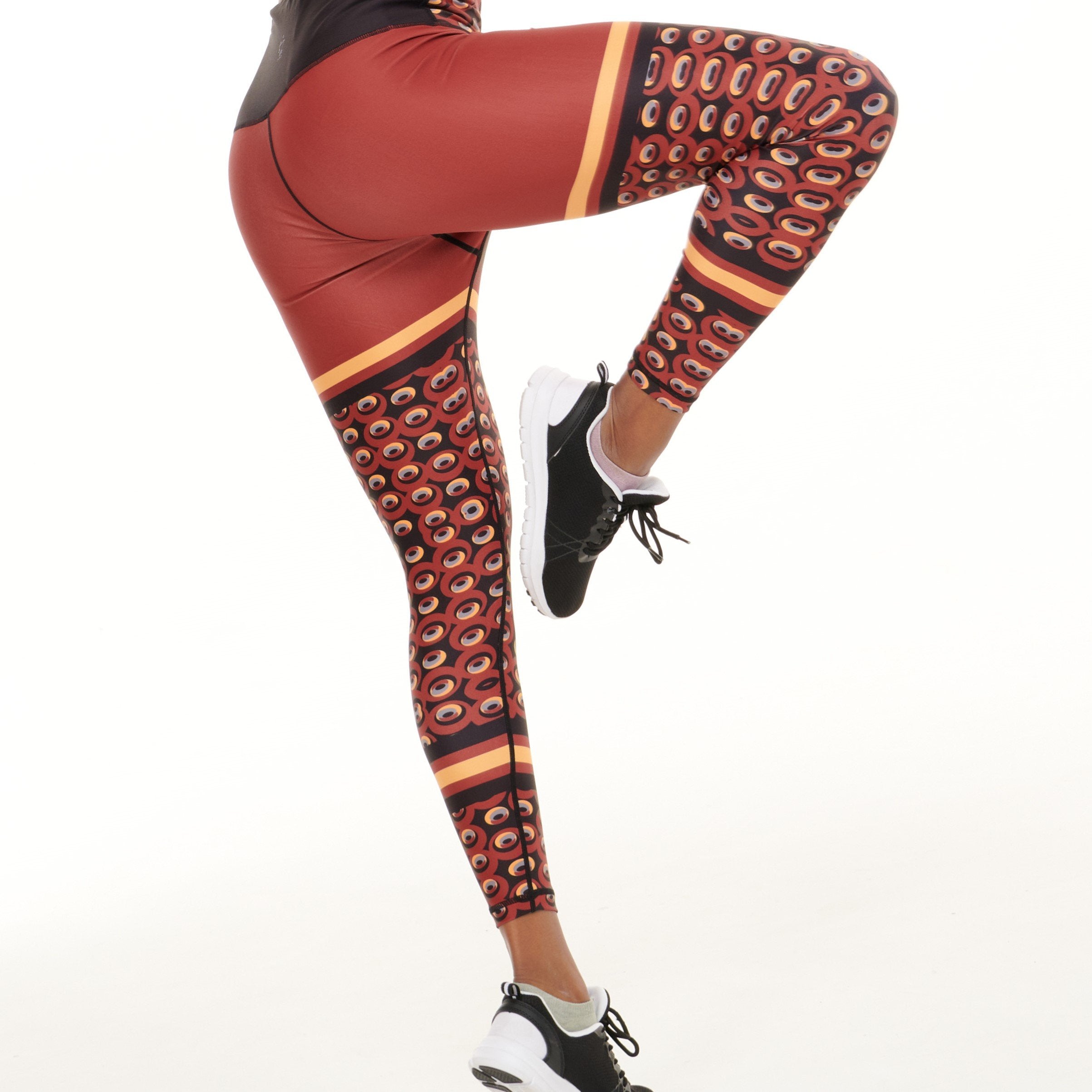Red funky Siefay On Iron activewear leggings by White Oliver with bold, vibrant patterns for stylish workout or casual wear.