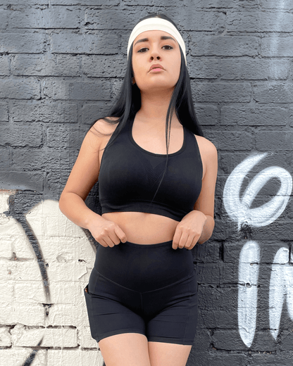 Black Lavender Jolie high-waisted athletic shorts with hip pockets, shown in black, designed for activewear and workout comfort.