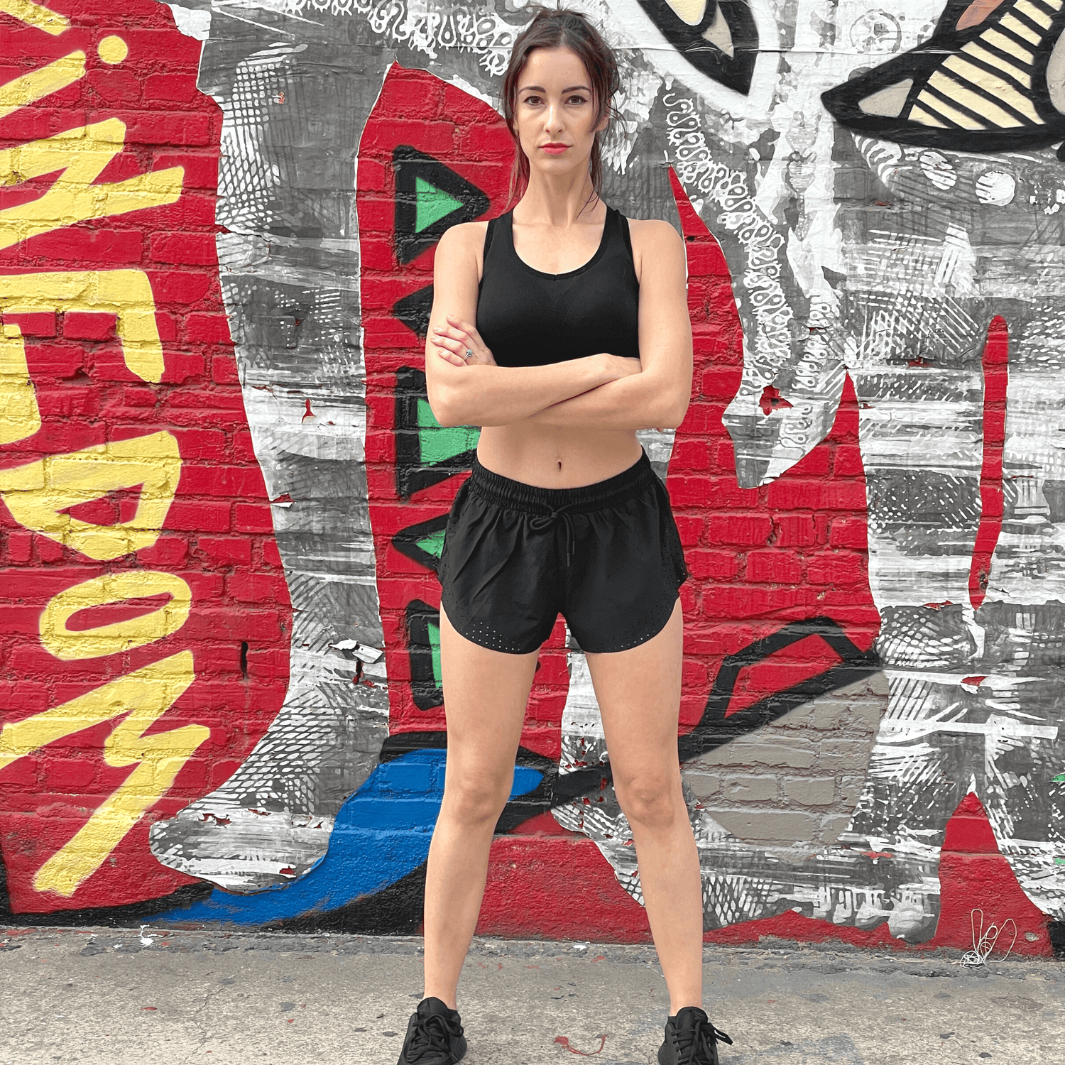 Black Lavender Arielle athletic shorts with built-in compression, featuring a sleek design and comfortable fit for activewear.