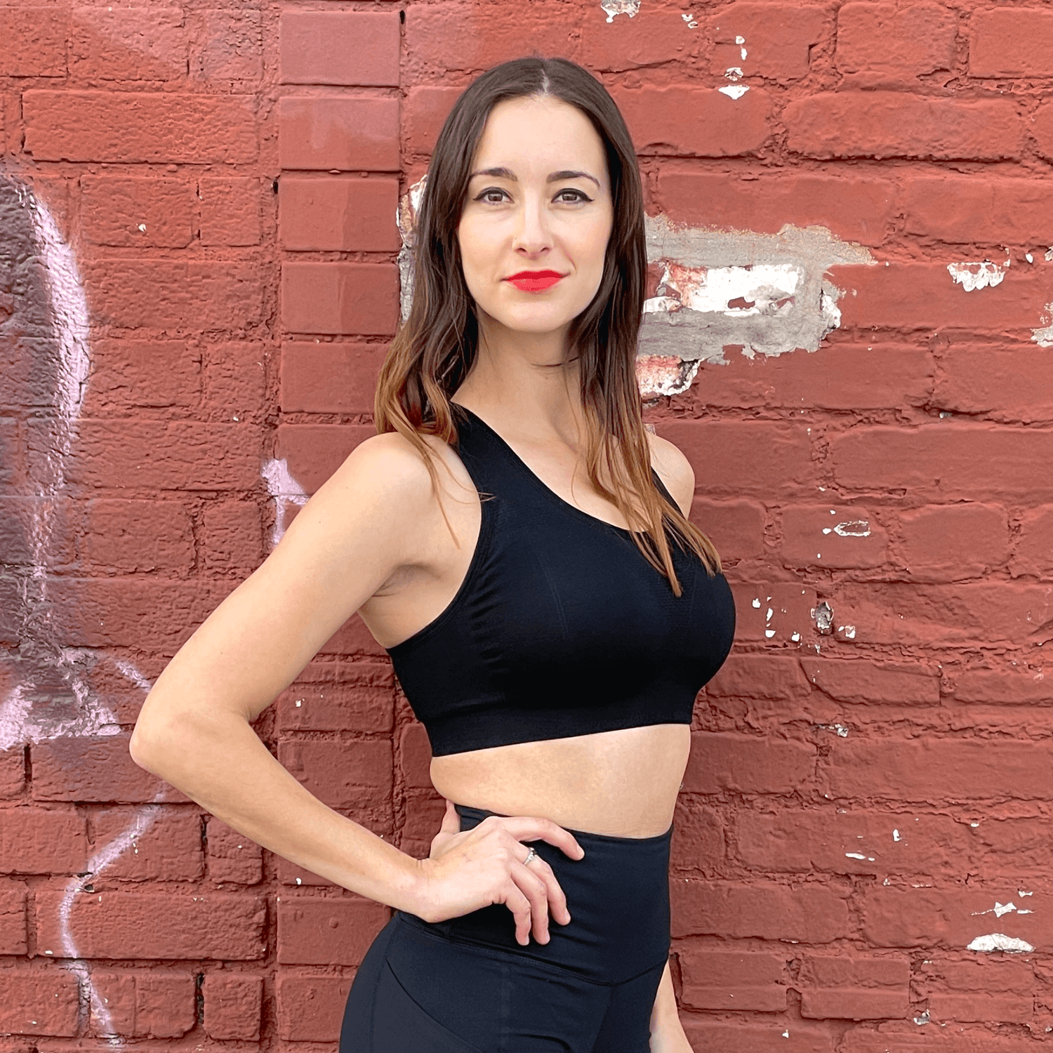 Black Lavender La Vittoria racerback athletic sports bra, activewear with supportive design and moisture-wicking fabric visible in the image.