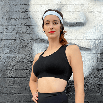Black Lavender La Vittoria Racerback Athletic Sports Bra shown in black, featuring a supportive racerback design for activewear.