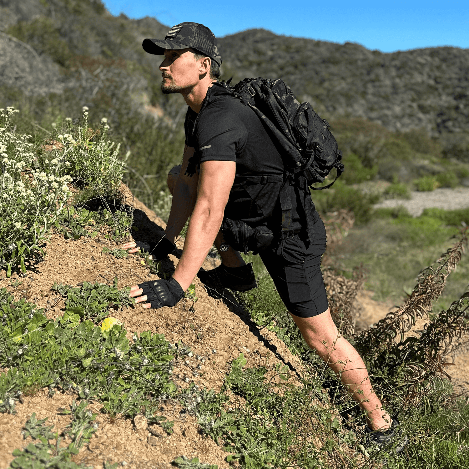 Black Lavender tactical fingerless airsoft gloves showing durable black fabric, breathable mesh, and adjustable wrist strap for outdoor sports.