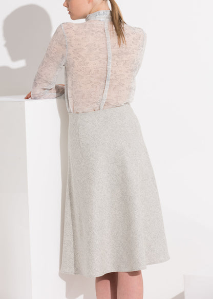 High waisted wool knit midi skirt in Heather Grey by Lemon Hera, featuring a snug fit and soft textured fabric.