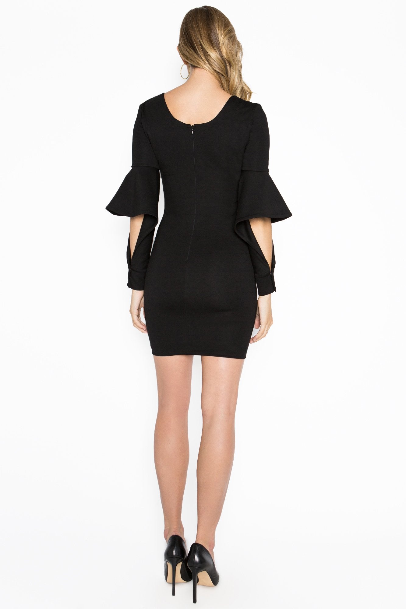Black Jayla dress by Peach Dionysus, a mini body-conscious dress with novelty cuffed bell sleeves, shown from the back.